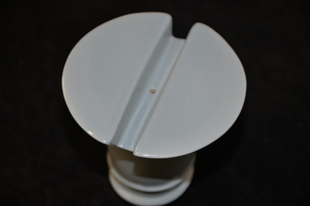 Salt shaker in shape of screw pale blue
